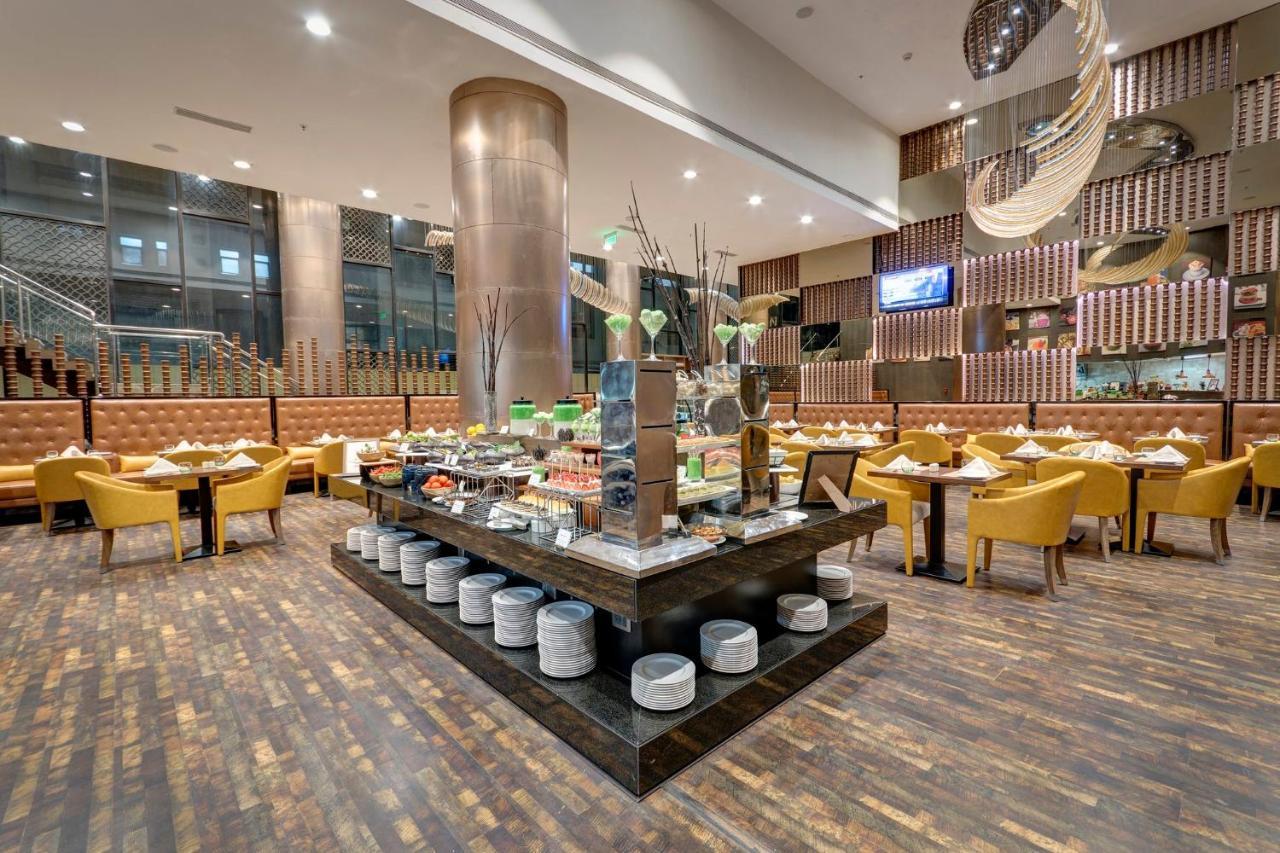 Holiday Inn Kolkata Airport By Ihg Zewnętrze zdjęcie The restaurant
